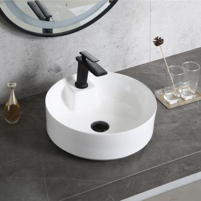 China HY-8121 Modern Round Shape 2021 New Counter Top Ceramic Basin for sale