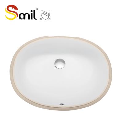 China Smooth Wholesale CUPC Certified Ceramic Basin Oval Bowl Bathroom Basin Under Counter Basin for sale