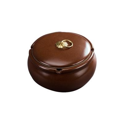 China Hot sale high quality handmade brown ceramic ashtray with cover for office decoration for sale