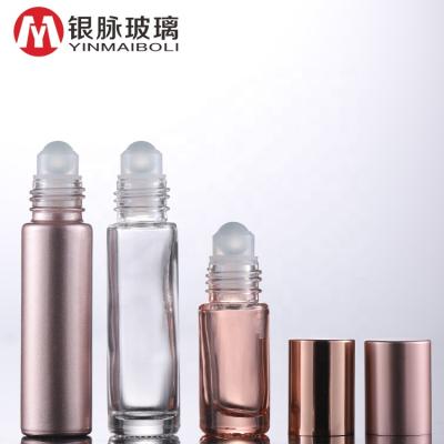 China Personal Care Essential Oil Use 10ml Pink Roll On Roller Glass Bottle With Crystal Gemstone Roller Ball And Rose Gold Cap for sale