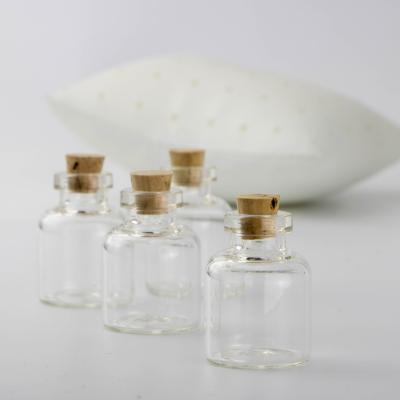 China Wholesale Personal Care 15ml 10ml 5ml Glass Cork Top Small Wooden Bottle for sale