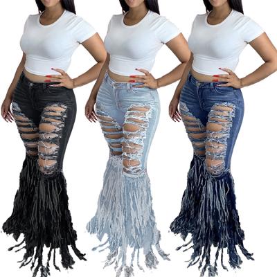 China Fashionable Denim Bell Bottom Jeans Destroyed High Waist Hollow Out Jeans With Long Tassel For Women for sale