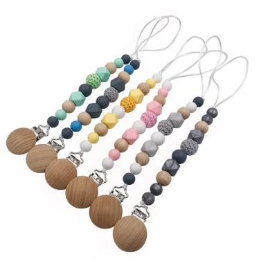 China Food Grade Soft Silicone Wooden Toy Wholesale DIY Beads Baby Teether With Pacifier Clip Holder for sale