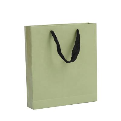 China Custom Recyclable Luxury Recyclable Sturdy Yellow Rose Green High Quality Gift Paper Bags With Ribbon Handles for sale