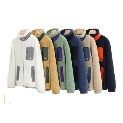 China 2021New Solid Color Patchwork Pocket Backing Thick Fleece Collar Windproof Plush Hoodie Plush Zipper Windproof Safari Jacket for sale