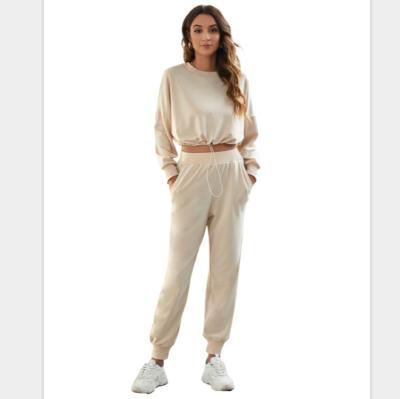 China 2021 Autumn New Product Breathable Solid Color Slash Neck Crop Top Pants Tracksuit Street Wear Two-Piece Set Suit For Women for sale