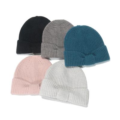 China COMMON New Fashion Winter Cute Women Beanies Solid Color Soft Bowknot Acrylic Beanie Knit Hat For Girls for sale