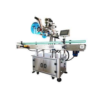 China Automatic top jar food bottle labeling machine top surfacelabeling machine for sale