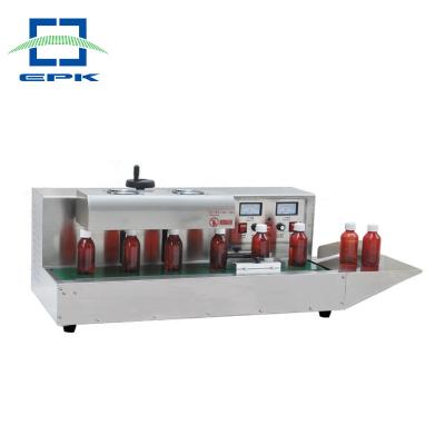 China Food Electromagnetic Induction Aluminum-foil Sealing Machine for sale