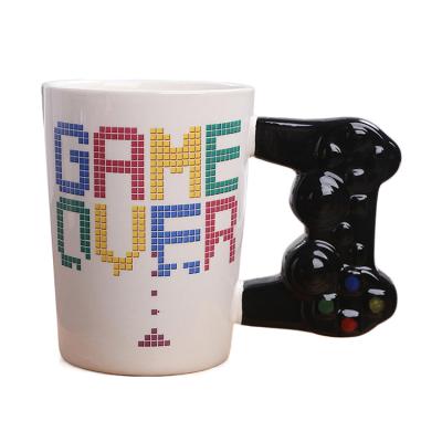 China Viable Ceramic Mini Factory Price Tea Cup Video Game Controller Shape Coffee Mug for sale