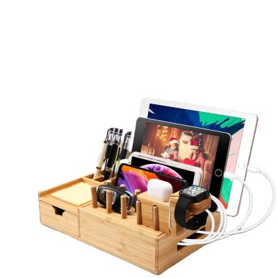 China Adjustable Bamboo Station Organizer Multi-Device Charging Dock Phone Organizer For Mobile Phone Wooden Docking Station for sale