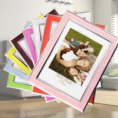 China 2021 hot wholesale cheap plastic photo display picture frame picture frames for wall home decor show baby table display for sale