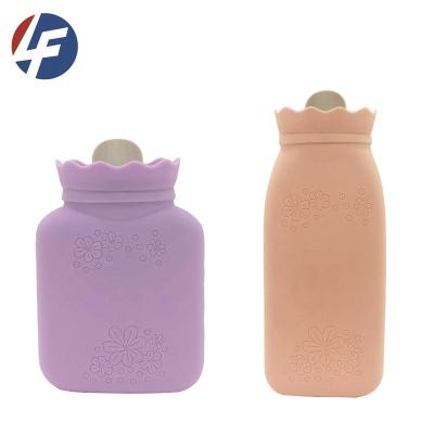 China Hot-selling silicone hand warmer water bottle with plush cover for pain relief for sale