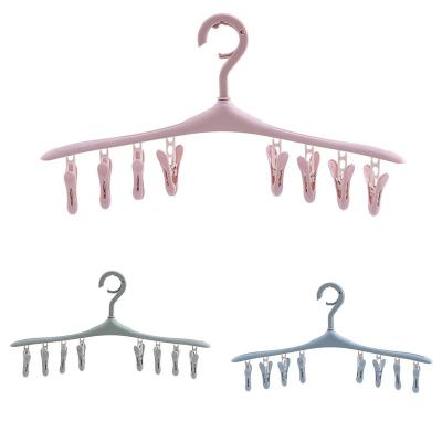 China Wholesale Custom Plastic Hangers Eco-friendly Material Rose Gold Colorful Non Slip Black Plastic Hanger With Hook Clips for sale