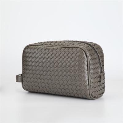 China High Quality Hold Money Cash Travel Toiletry Bag Braided PU Leather Bag Leisure Cosmetic Clutch Bag for sale