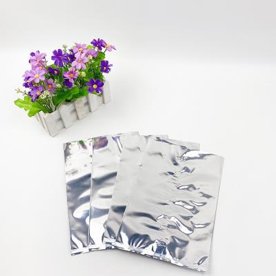 China Biodegradable Manufacturer Size Three Sides Custom Biodegradable Silver Seal Coin Mylar Bag Aluminum Foil Bag Tear Packing Notch for sale