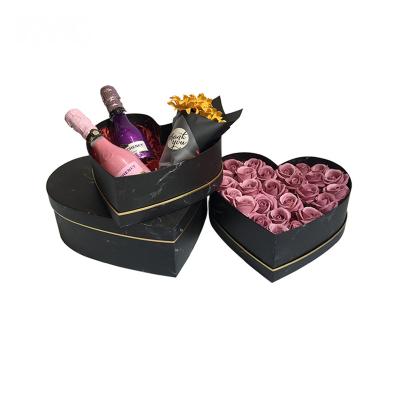 China Recyclable Marble Bronze Heart Shaped Flower Box Three Piece Set Hand Printing Gift Box for sale