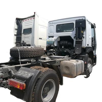 China New And Used Duty Power Engine Wheel FAW Shacman Sinotruk Howo Diesel Truck Tractor Tow 4*2 6985*2496*3850mm for sale