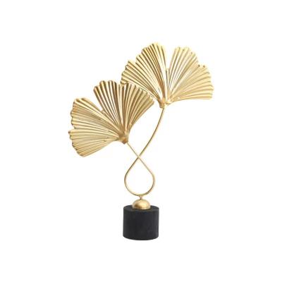 China Handcrafted Bohemian Metal Palm Leaf Sculpture Metal Art Sculpture Home Decoration for sale