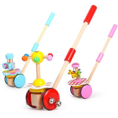 China Push-n-Pull Soft Wooden Activity Dance Gain Butterflies Push Wooden Walking Toy for sale