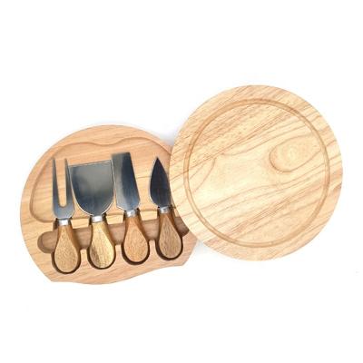 China Custom Wholesale High Quality Sustainable Round Cheese Rubber Wood Board Set With 3 Knives for sale