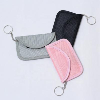 China Simple Business Oxford Fiber Car Key RFID Safe Signal Blocking Bag Shielding Faraday Pocket Car Key Signal Blocking Bag for sale