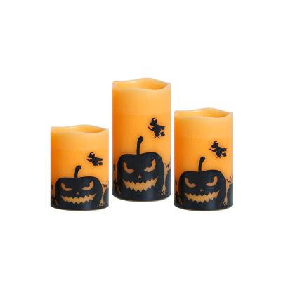 China Home Decoration Pumpkin Looking LED Pillar Shape Candles Set For Halloween Decor for sale