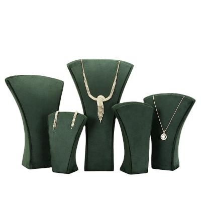 China New design OEM+ODM+wholesale jewelry display stand green propeller shaped necklace pendant jewelry stand jewelry display stand for sale