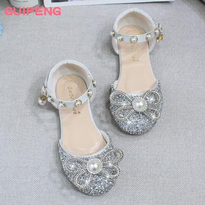 China 2023 Summer New Korean Style Rhinestone Breathable Soft Soled Girls Sandals Bow Decorative Dance Princess Shoes For Kids for sale