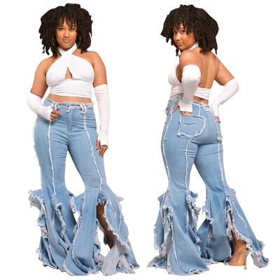 China QUICK DRY Ripped Hole Jeans Women Fringe Ruffle Bottom Tassels Split Flare Pants Mid Waist Bodycon Pants Jeans Pants Women for sale