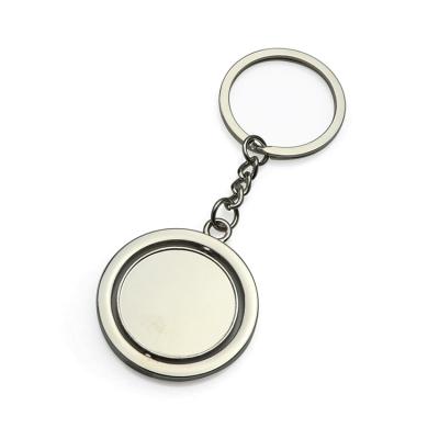 China Metal Vacuum Metal Custom Round Rotary Spinning Key Chain for sale