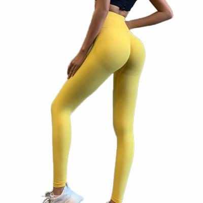 China Breathable Girls Candy Color Peach Color High Stretch Long Pants Hip Lift Yoga Wear Tight Jogging Quick Dry Pants for sale