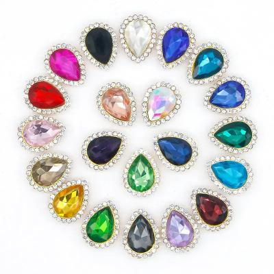 China Best Quality Flatback Crystal Diamond Sun Flower Drop Shape Claw Setting Rhinestone Glass Gems Sew On Flower Rhinestone For Garment for sale