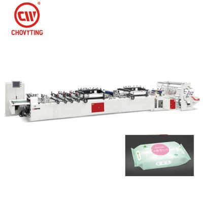 China Multifunctional Full Automatic Center Seal Fabric Wet Bag Making Machine With Label Device for sale