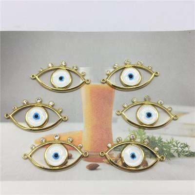 China Hot Selling Copper Jewelry Findings And Components Eye Shape 18k Gold Plated Connectors For Jewelry Making for sale