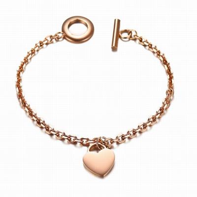 China TRENDY high polished finished rose gold stainless steel trendy cable chain bracelet with heart charm and toggle clasp closure for sale