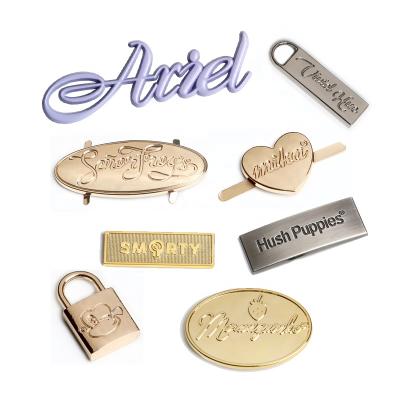 China Sustainable Customized Garment Metal Brand Plate Metal Name Tag Clothing Logo for sale