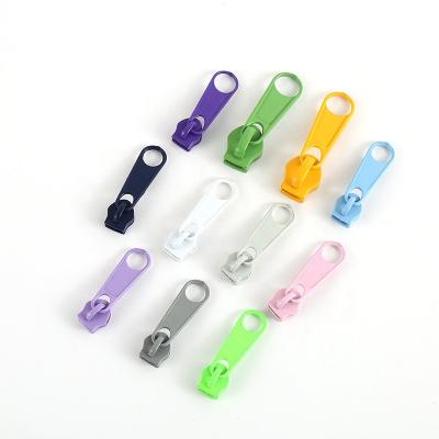 China Nickel Free Wholesale Customized Rubber Head Zipper Puller Custom Design Accessory Garment Zipper Puller for sale