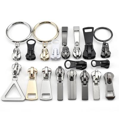 China Nickel Free Logo Leather Zip Slider Custom Metal Zipper Puller for sale