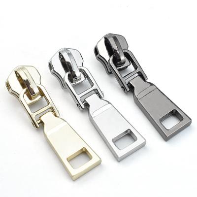 China Custom Embossed Nickel Free Brass Rubber Design Logo Zipper Pull Puller for sale