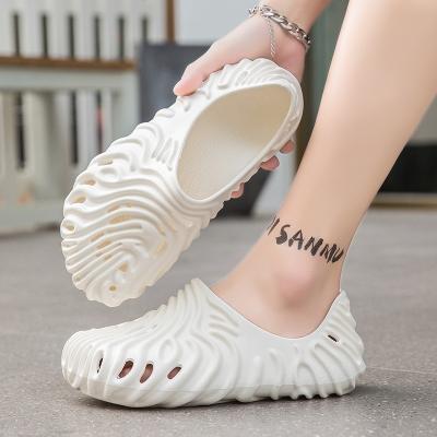 China Hot Selling Breathable Coconut Hole Shoes Summer New Men Fashion Outdoor Breathable Anti-Slip Couples Women Slips EVA Sandals for sale