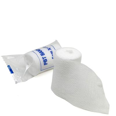 China Mini Disposable Medical Elastic PBT Bandage Web Roll Conforming Bandage for sale