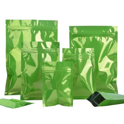 China 100Pcs Barrier Stand Up Mylar Bag Green Color Aluminum Foil Packaging Pouch WithZipper Lock for sale