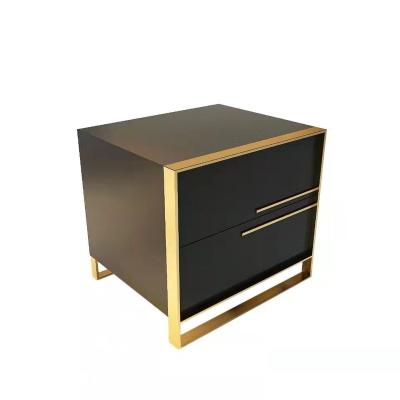 China Simple modern post-modern light luxury style bedside table stainless steel painting stainless steel bedroom storage black and white luminous gold plated stor for sale