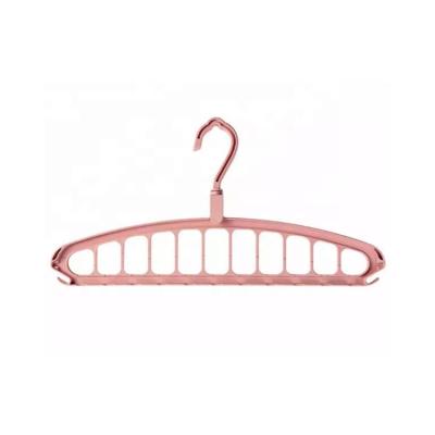 China Custom 9 Holes Eco - Friendly Folding Magic Foldable Cloth Hanger Travel Hanger for sale