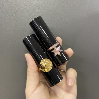 China Round glossy lipstick tube with gold star trim good quality 12.1mm pink hot stamping new design cosmetic lipstick luxury star tube with custom color golden rose balance logo for sale