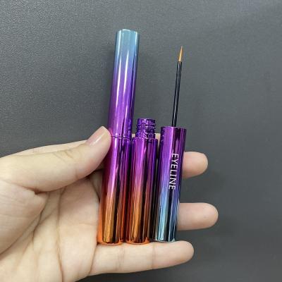 China Round Liquid Eyeliner Tube With Brush 5.2ml Hot Selling Round Slim Empty Blown Plastic Eyeliner Cosmetic Container Metallic Purple Eyeliner Tube Bottle With Slim Brush for sale