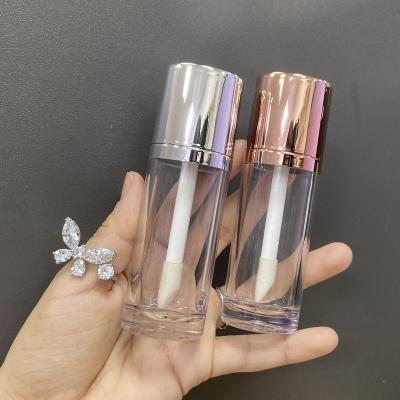 China Unique Big Foundation Liquid Bottle With Brush Applicator 30ml Custom Logo OEM Plastic Empty Cosmetic Foundation Liquid Bottle Round Base Silver Clear Stick With Huge Brush Wand for sale