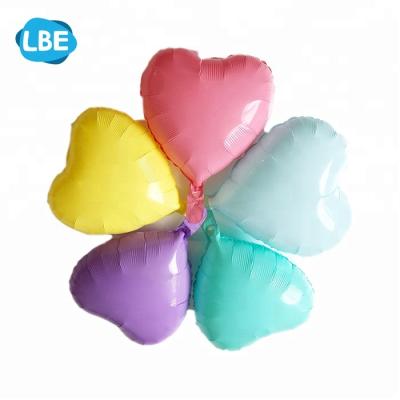 China 17 inch heart round shape macaroon color globos por d'al por mayor gift toy for sale