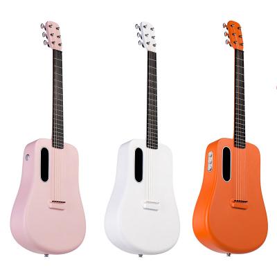 China 2022 new style carbon fiber hot sale carbon fiber guitar with pickup acoustic electric instrument 36 inch travel guitar with bag for sale